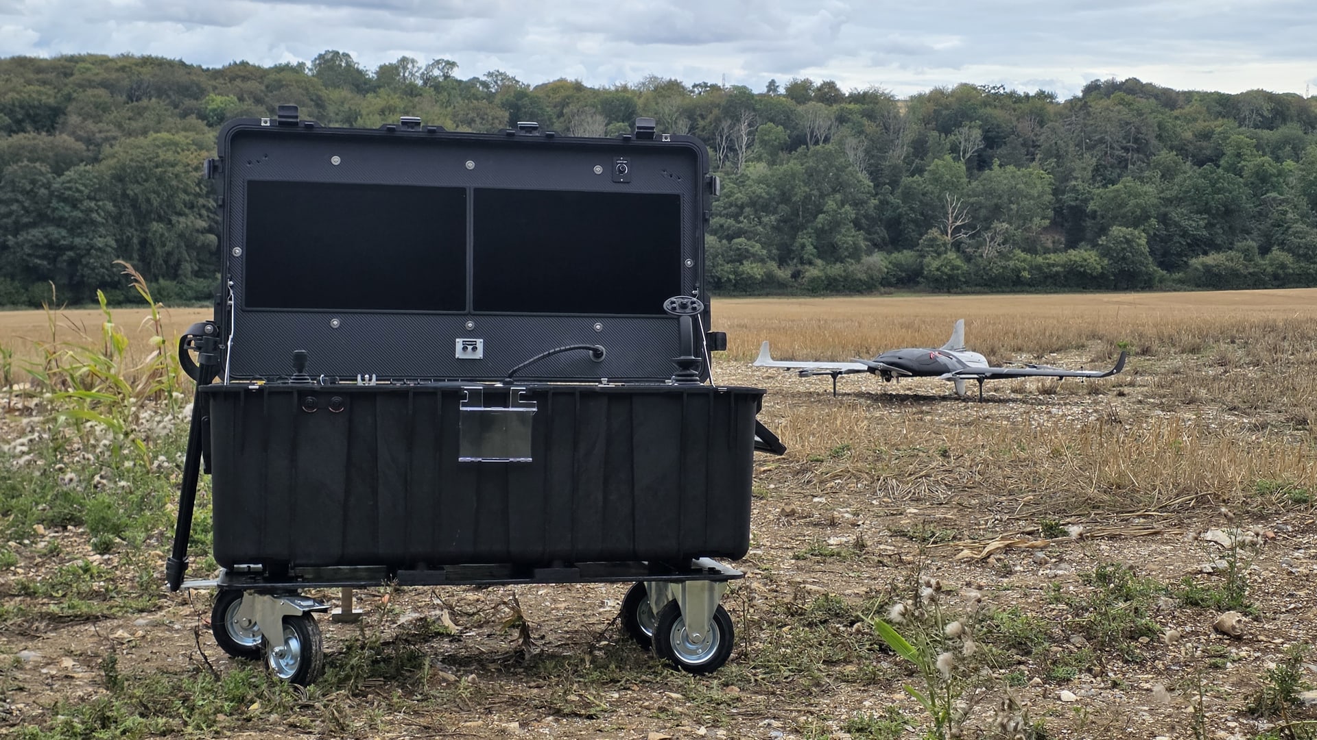 BREMIS portable ground control station with a Judicar aircraft in the field