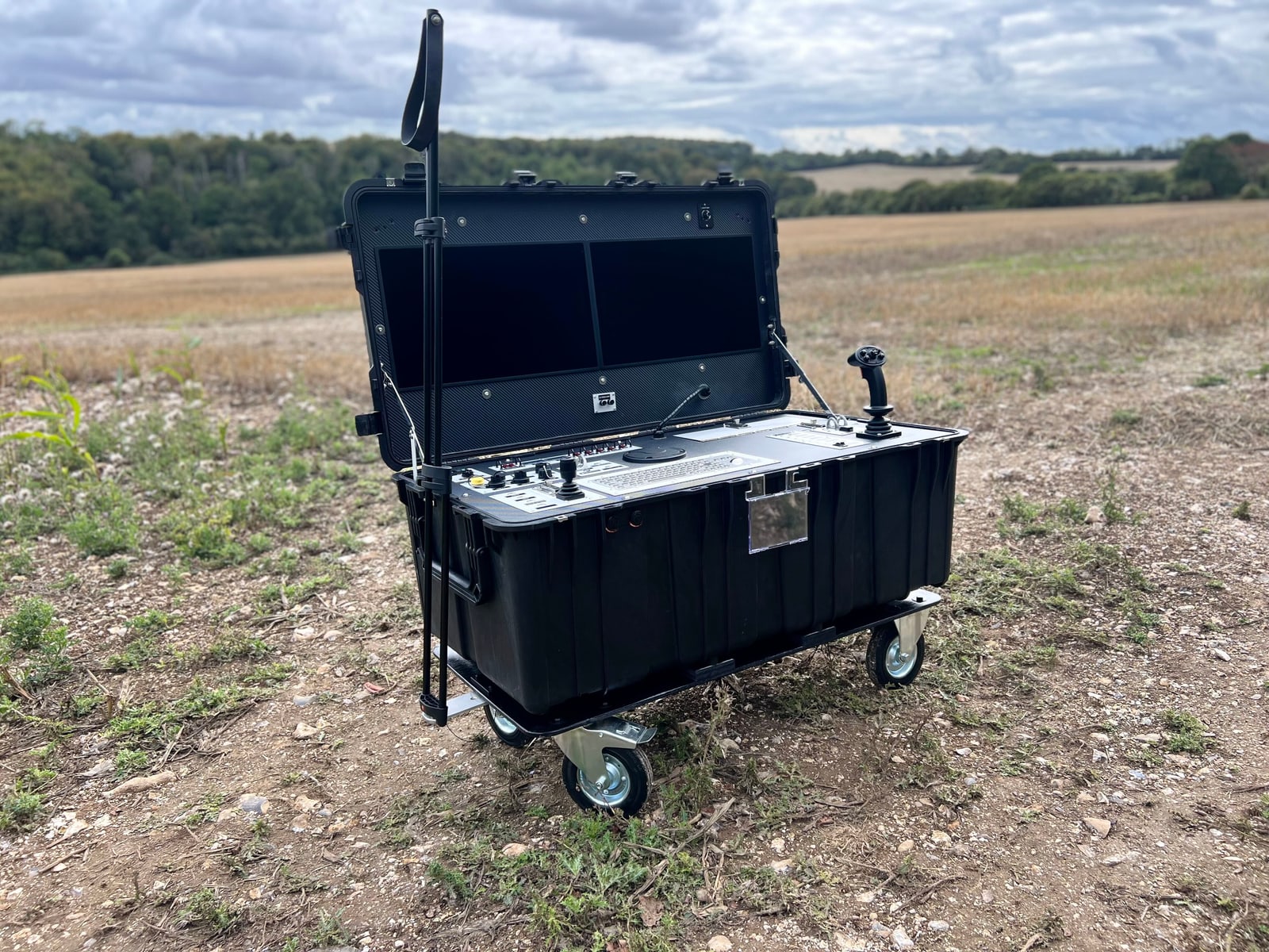BREMIS ground control station in its wheeled case with the console open outdoors
